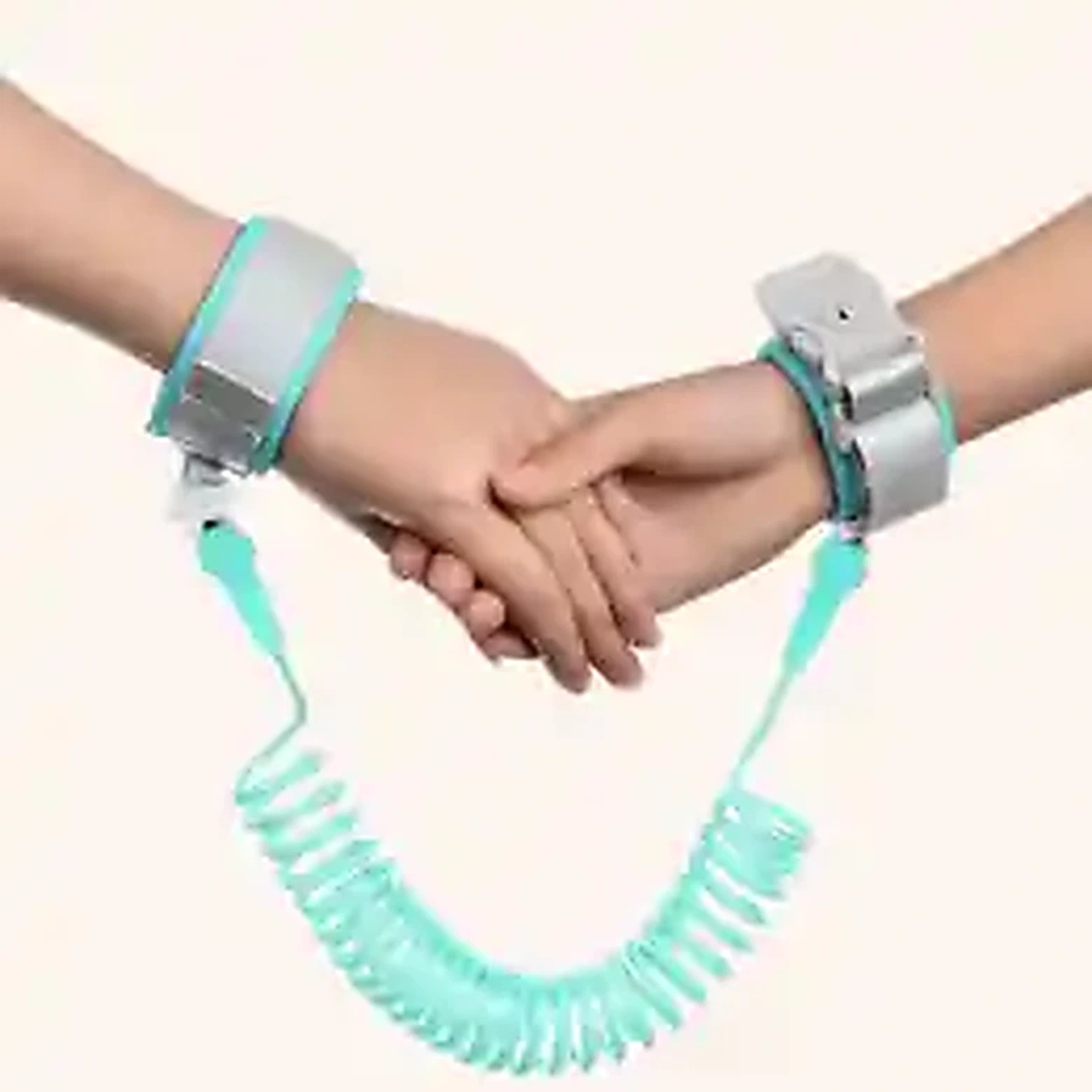 Adjustable child safety wrist link harness with coiled tether