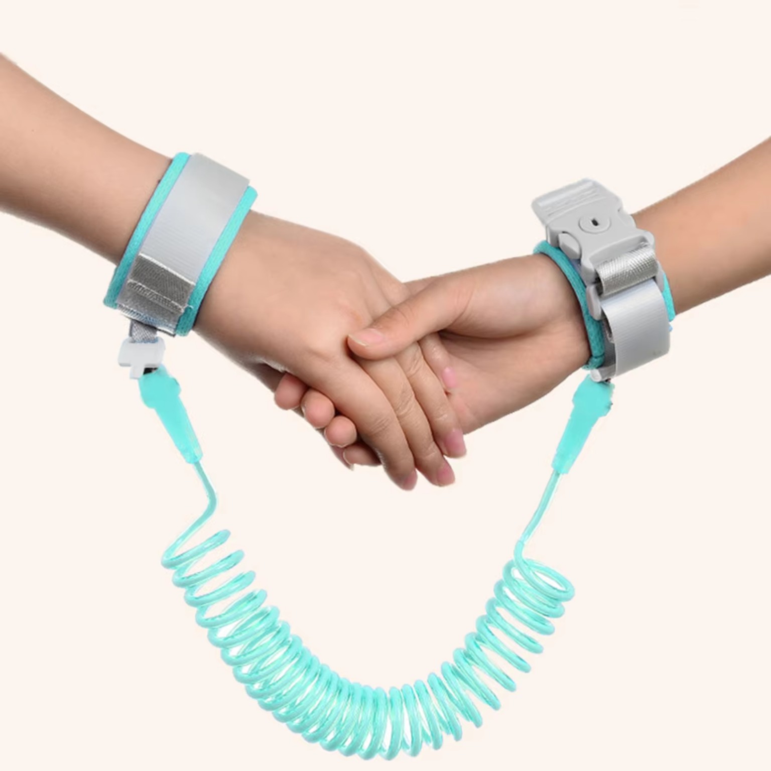 Adjustable child safety wrist link harness with coiled tether