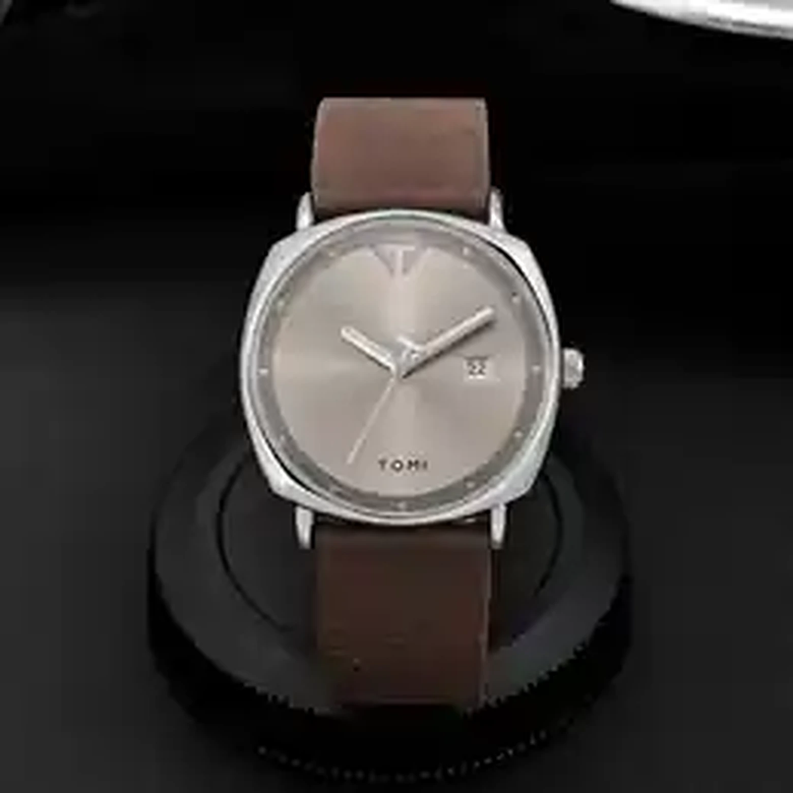 TOMI men's watch worn on wrist