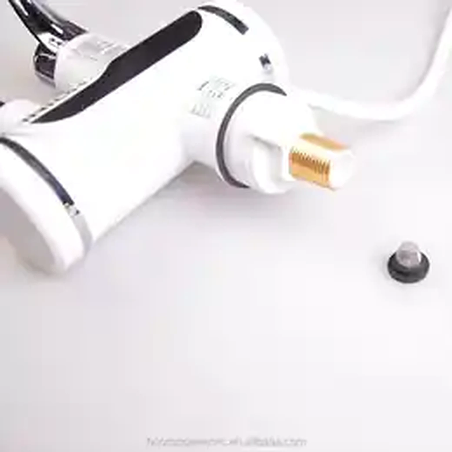 Electric water heater faucet connection detail