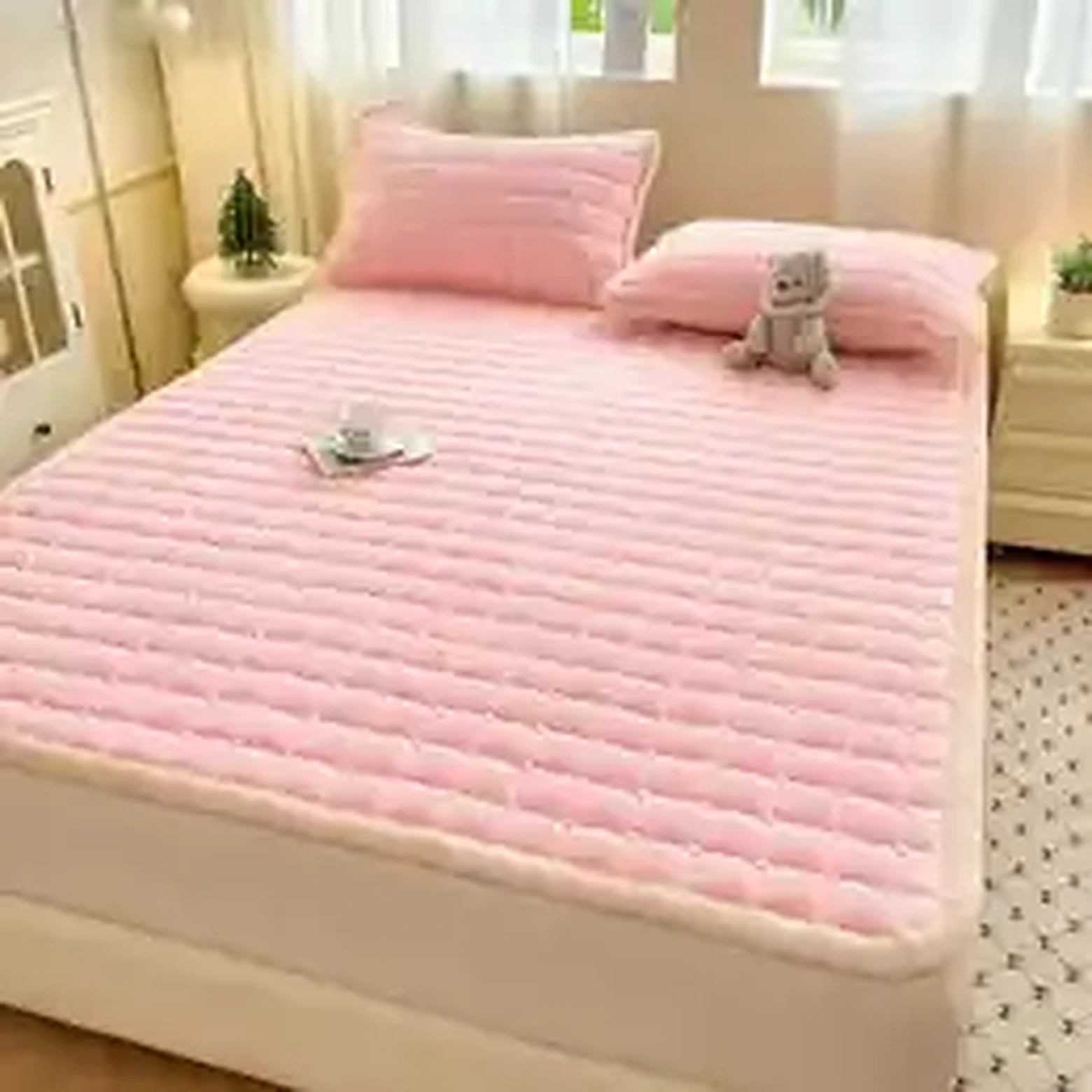 Quilted mattress pad rolled for storage