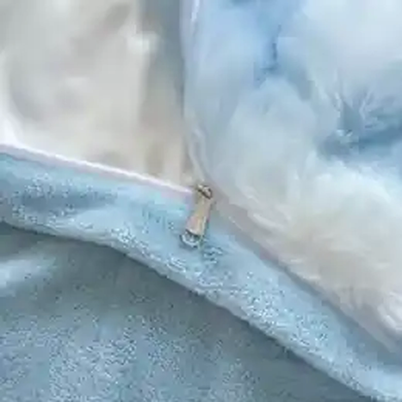 Blue plush fleece texture close-up