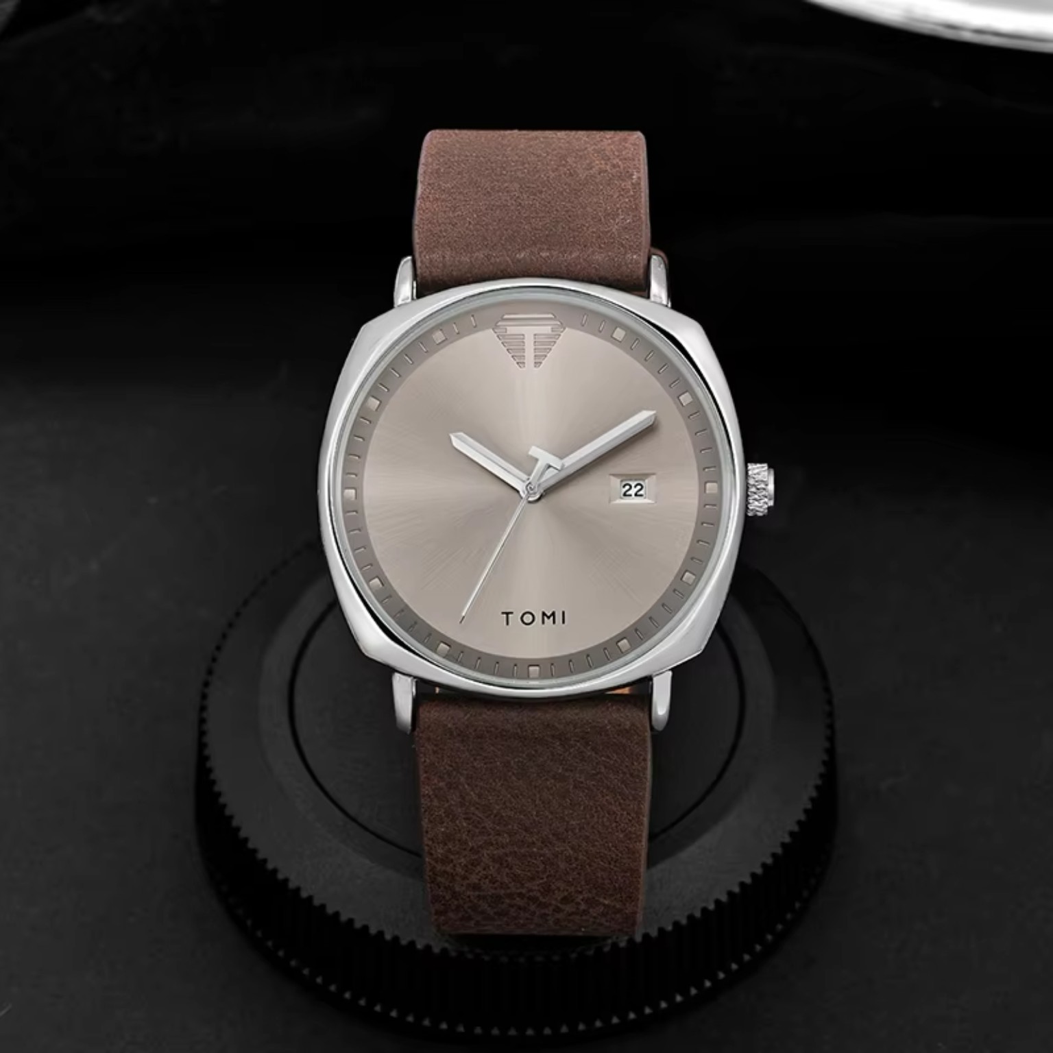 TOMI men's watch worn on wrist