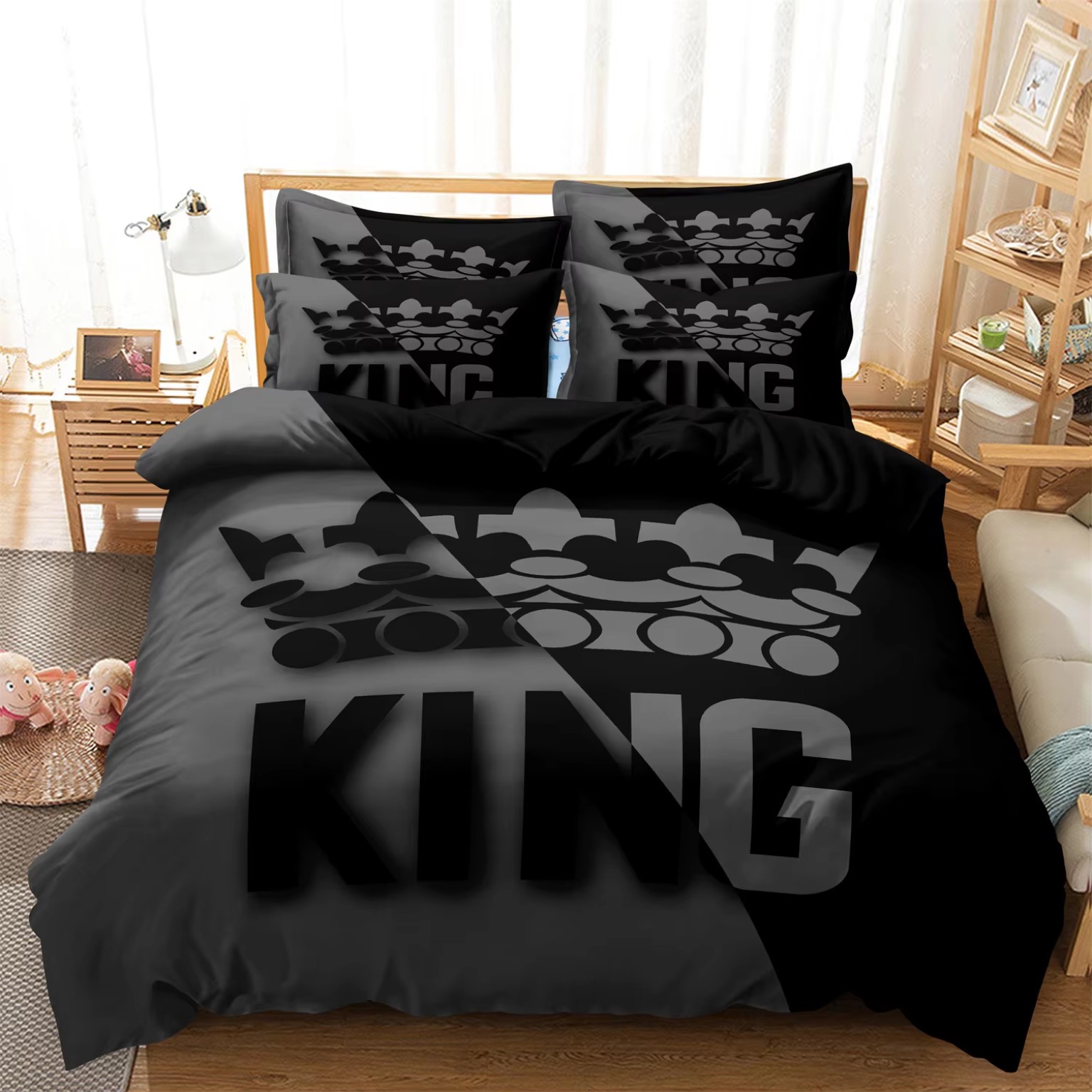 Black and gray duvet cover set on a wooden bed