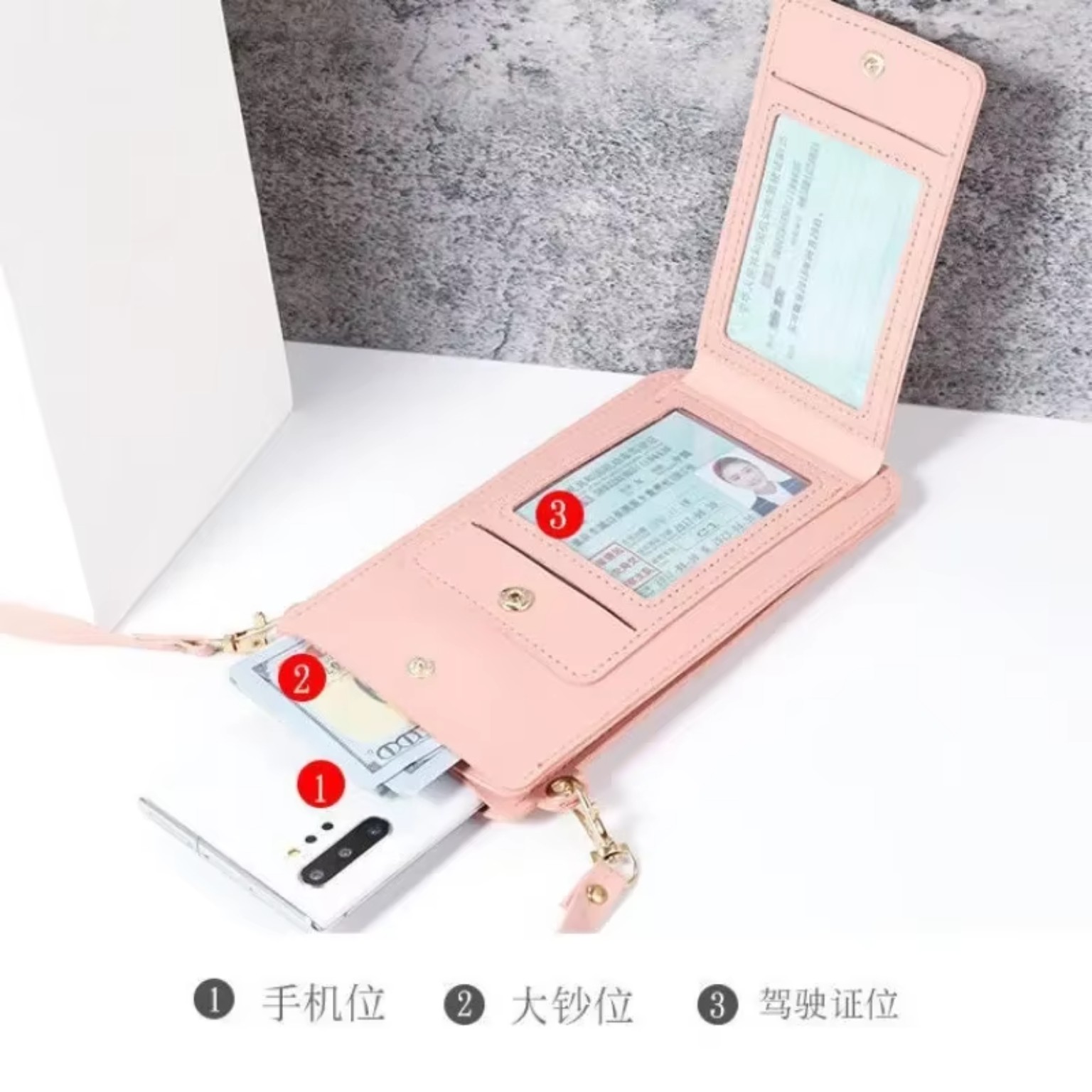 Pink phone bag opened showing storage compartments